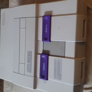 SNES w/ 2 controllers and super mario